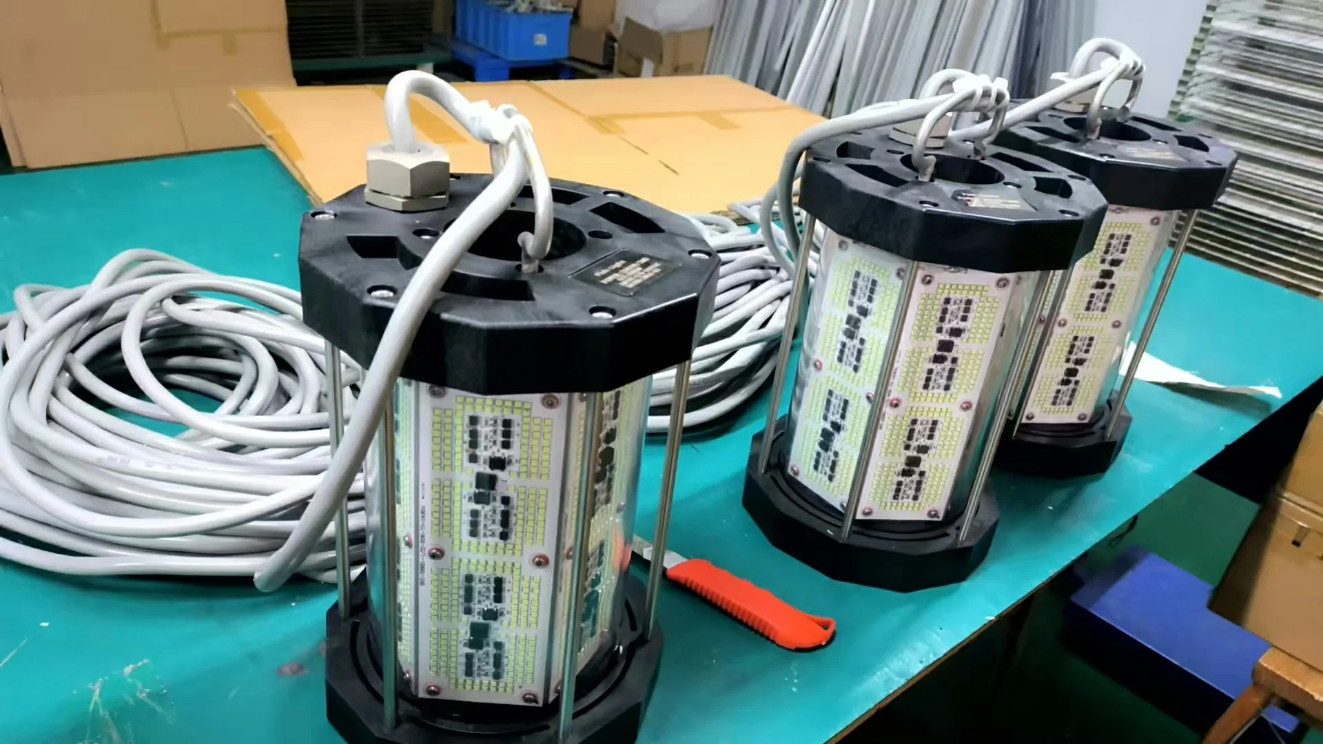 Underwater LED fishing lights on workshop workbench
